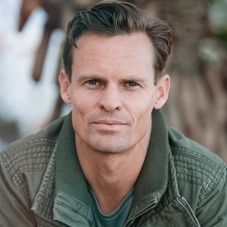 A photo of a man facing front